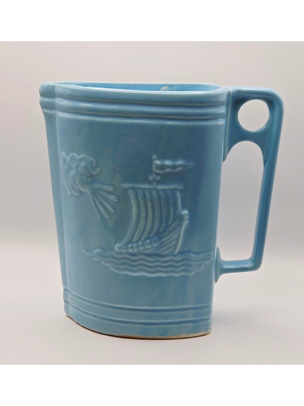 Vintage Ransbottom Blue Pottery Pitcher With Embossed Viking Ship & Wind Face De